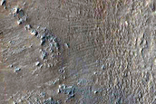 Contact between East Daedalia Planum Flows and Claritas Fossae Upland