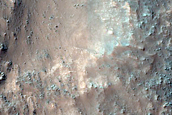 Hellas Planitia Massif Exposing Putative Layered Igneous Intrusions