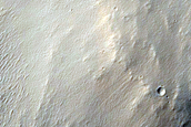 Impact-Related Deposits and Flows Southwest of Pettit Crater