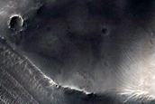 Valley Attached to Northern Mid-Latitude Crater