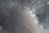 Deposit in Small Northern Mid-Latitude Crater