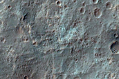 Positive Relief Material in Association with Osuga Valles Depression