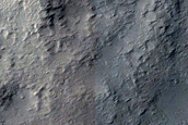Ejecta Blanket and Distal Flows Southwest of Pettit Crater