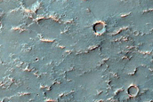 Mafic Mineral Exposures on Crater Floor near Oenotria Scopuli