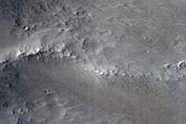 Deposit in Small Northern Mid-Latitude Crater