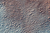 Dipping Layers near Mound in Hellas Planitia