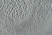 Inverted Valley and Rings near Erebus Montes