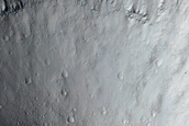 North-Pole-Facing Deposit in Crater Associated with Headwall Erosion