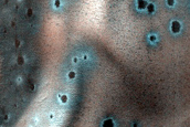 Low-Latitude Dunes with Seasonal Spots
