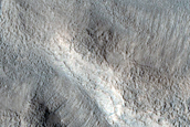 Streamlined Shape and Possible Bar South of Semeykin Crater