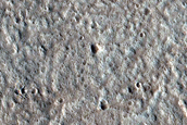 Pole Facing Deposit in 10-Kilometer Crater