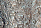 Possible Mafic Minerals on Plains Northwest of Hellas Planitia