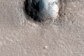 Small Crater with Dark Ejecta in Northern Plains