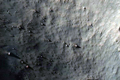 Possible Bedrock Exposure on Floor of 21-Kilometer Crater in Tyrrhena Terra