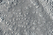 Irregular Terrain near Crater in Arabia Terra