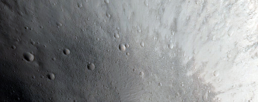 North-Pole-Facing Deposit in Crater Associated with Headwall Erosion