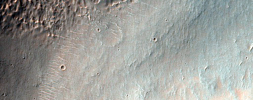 Channel near Crater Ejecta in Terra Cimmeria