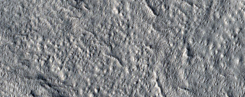 North-Pole-Facing Deposit in Crater Associated with Headwall Erosion
