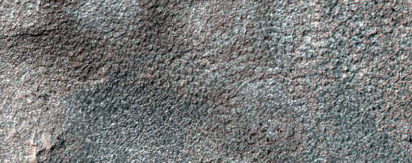 Crater in Charitum Montes