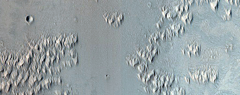 Candidate Recent Impact Site in Wall of Ius Chasma