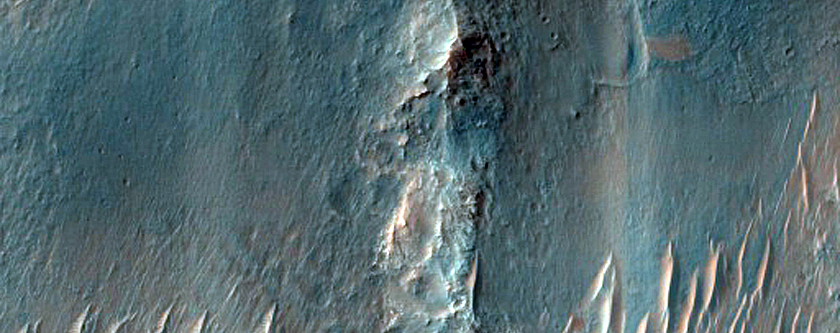 Diverse Bedrock Exposure Beneath Extensive Clay Unit in Her Desher Vallis