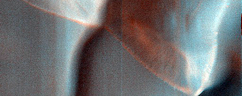 Monitoring Gullies and Dunes in Halley Crater