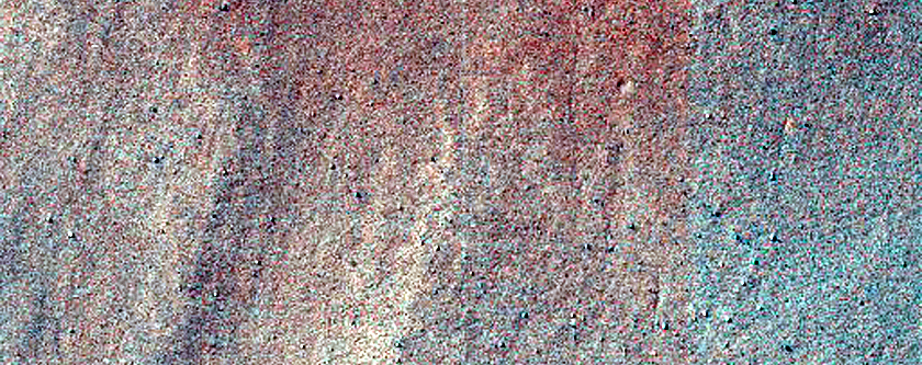 Triangular Scars on Hillslopes