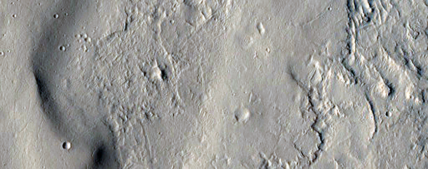 Curvilinear Landforms in Arabia Terra