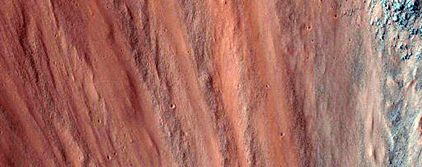 Very High Thermal Inertia Values in Coprates Chasma Walls