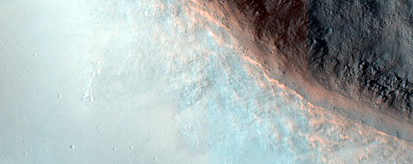 Mafic Minerals Exposed by Crater on Southwest Syrtis Major Planum