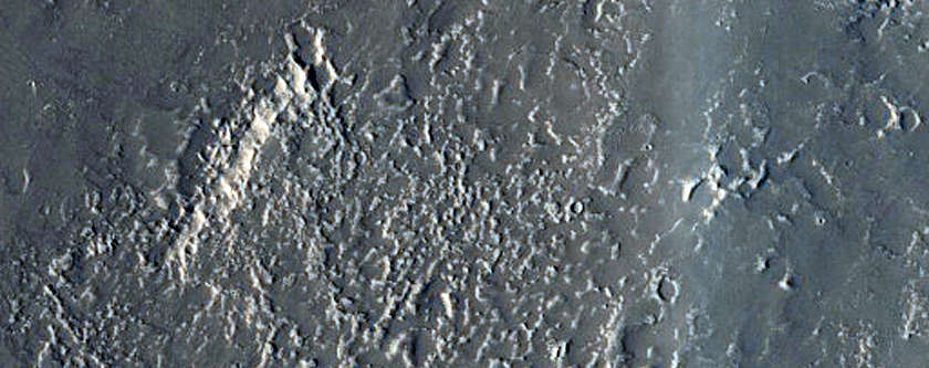 Layers in Depression on Crater Floor in Northern Mid-Latitudes