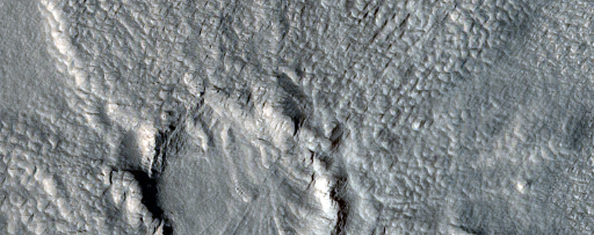 Pedestal Crater near Lobate Debris Apron Margin in Phlegra Montes