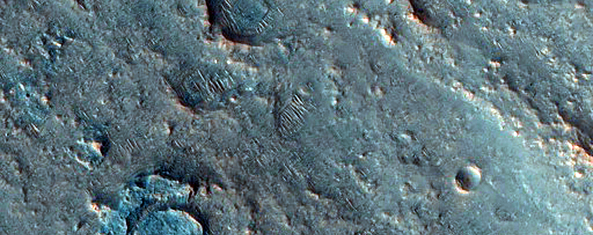 Young Ejecta from Beruri Crater with Possible Clays