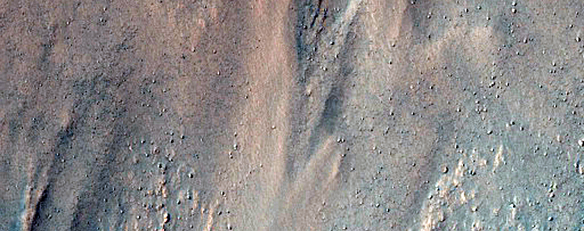 Triangular Scars on Hillslopes