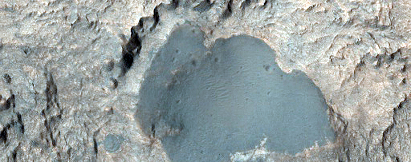 Light-Toned Layered Deposits on Northern Edge of Hellas Planitia