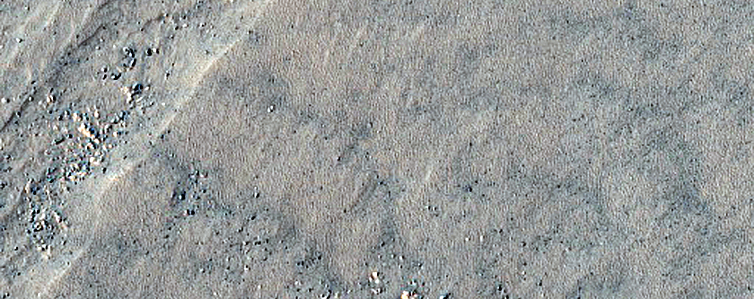 Triangular Scars on Hillslopes