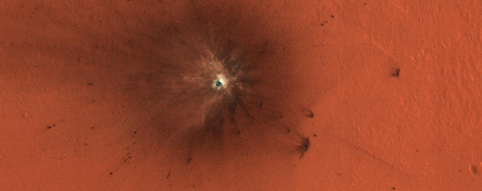A New Impact Crater Exposes Bright Material