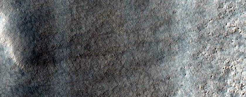 Ice-Exposing Scarp at Redi Crater