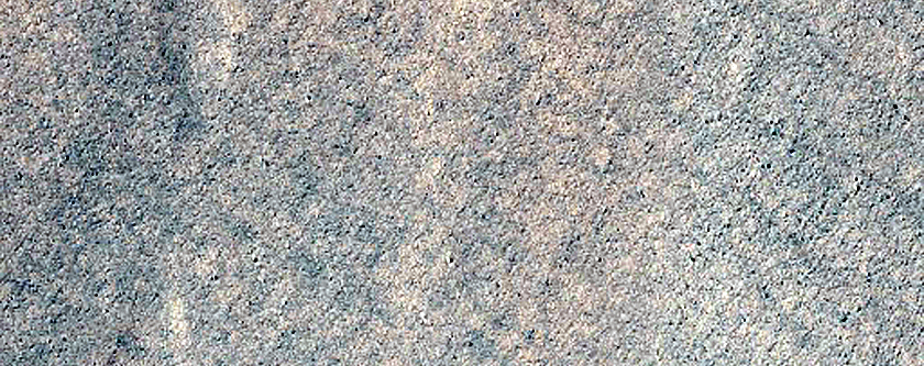 Triangular Scars on Hillslopes