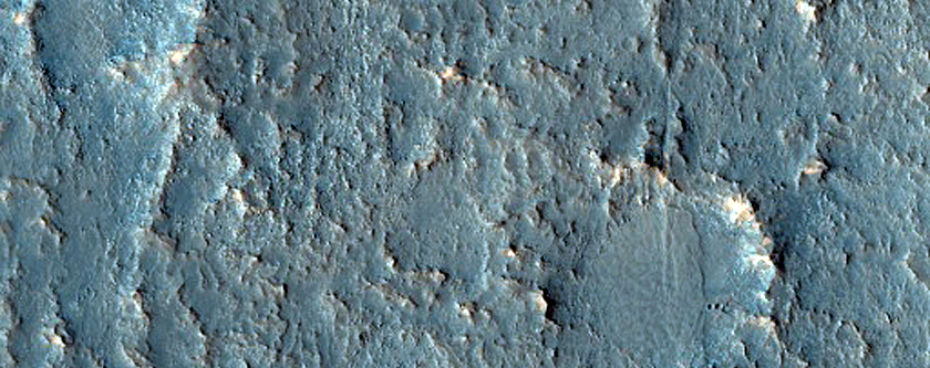 Fault Scarp and Mounds near Claritas Rupes