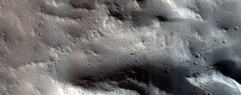 North-Pole-Facing Deposit in Crater Associated with Headwall Erosion