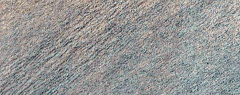 Triangular Scars on Hillslopes