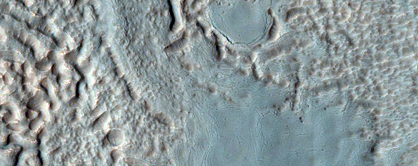 Possible Gully-Associated Light-Toned Material Northeast of Argyre Planitia