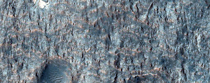 Light-Toned Layered Deposits on Northern Edge of Hellas Planitia