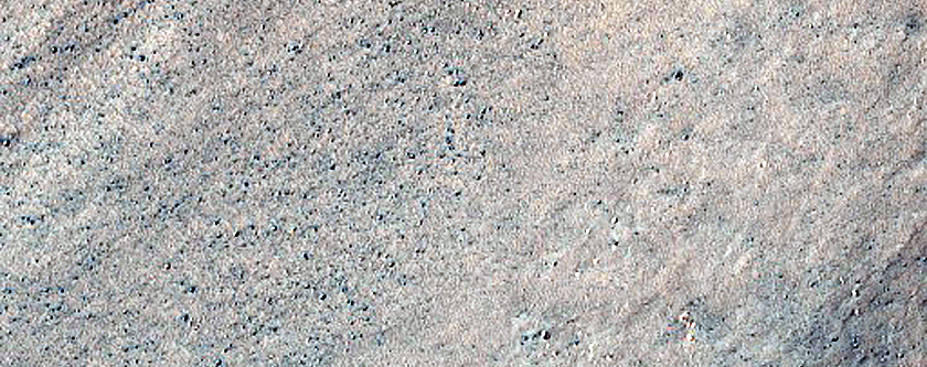 Triangular Scars on Hillslopes