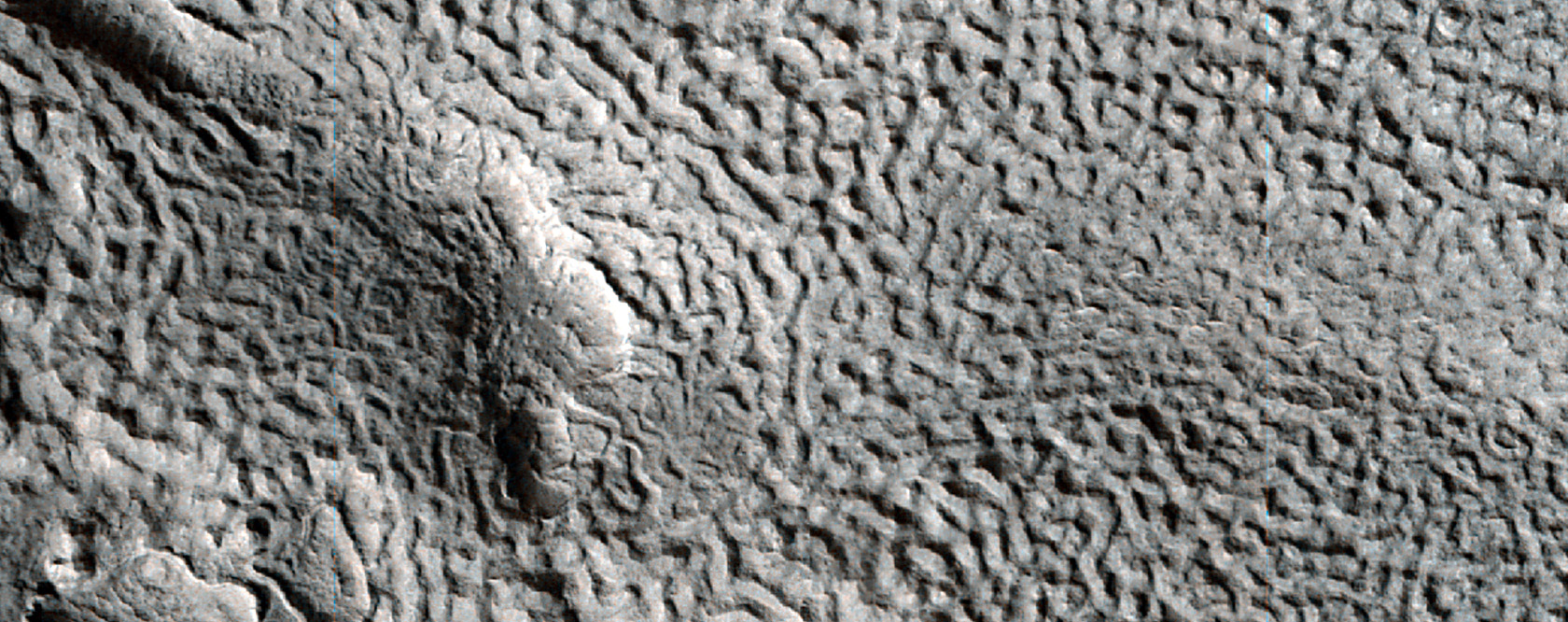 Eroding Ice-Rich Deposits in Two Craters in Arabia Terra