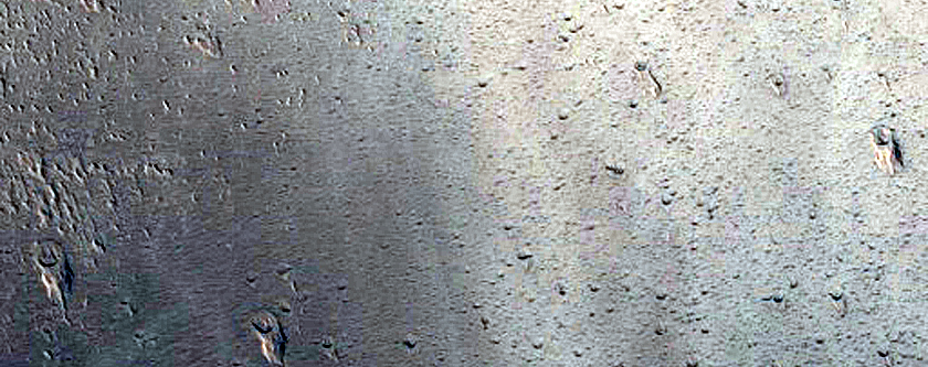 Crater Overlaying Tithoniae Fossae