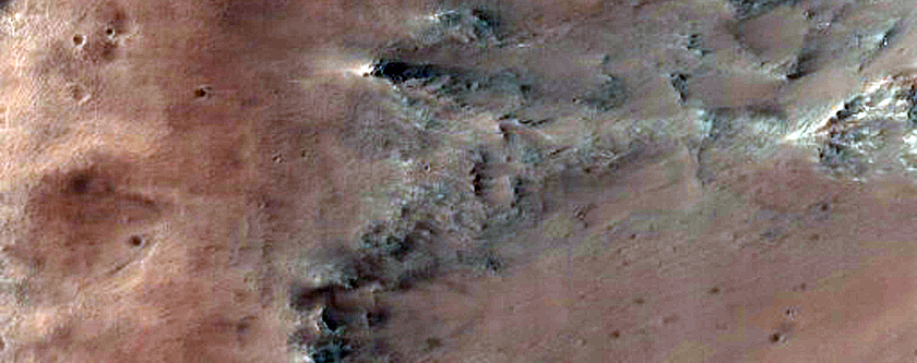 Lower Stratigraphy of Her Desher Vallis Exposed in Spurs