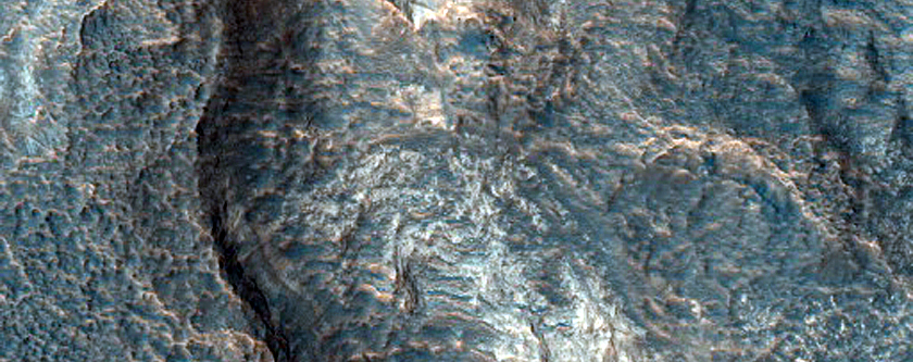 Light-Toned Layered Deposits on Northern Edge of Hellas Planitia