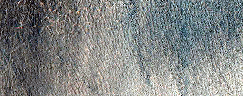Triangular Scars on Hillslopes